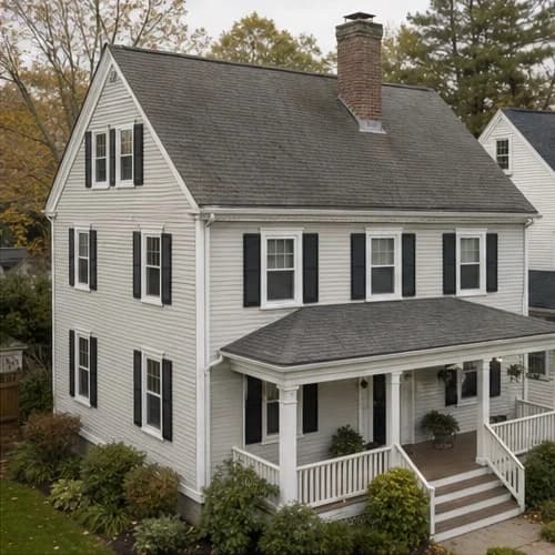 Aged asphalt shingle roof before replacement